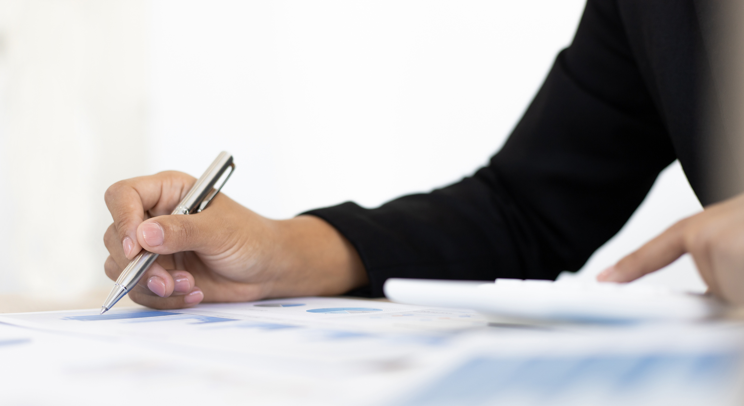 Businesswoman Reviewing a Report   